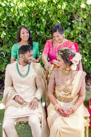 Bride and Groom During Traditional Indian Wedding Ceremony, Customs, Gold Outfits