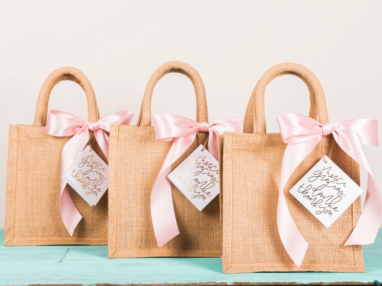 Cute burlap tote bags with personalized tags. 