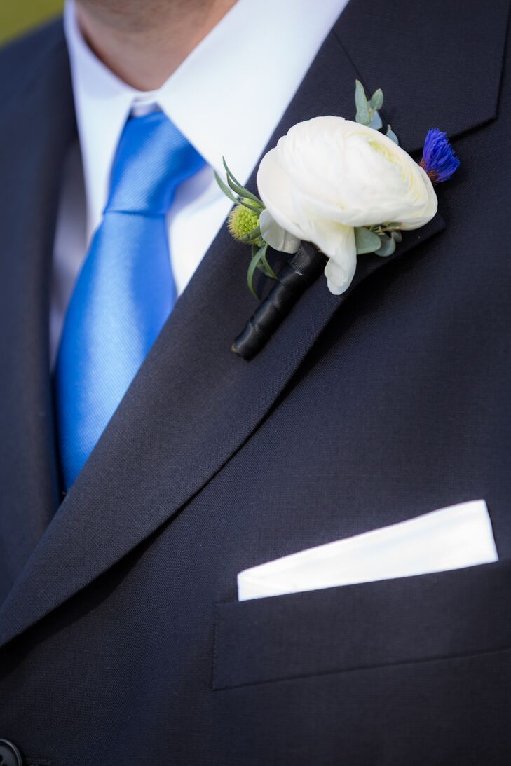 For the groom's boutonniere, florist Anthony Brownie relied on a palette of white and green to offset his navy suit.