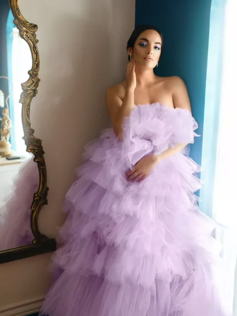 bride with updo and purple smokey eye