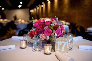 Fuchsia and Red Floral Centerpiece With Dusty Miller