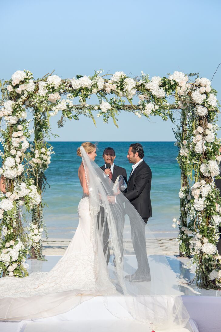 To honor the different cultures of Michelle and Vincent’s families, the officiant hosted the ceremony in French, Spanish and English. To honor multiple traditions, the couple performed the Catholic lasso ceremony as well as the Jewish breaking of the glass.