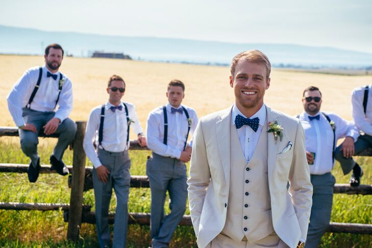 Tan Groom's Suit With Navy Bow Tie