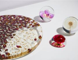 Resin orchid paperweight in glass ball