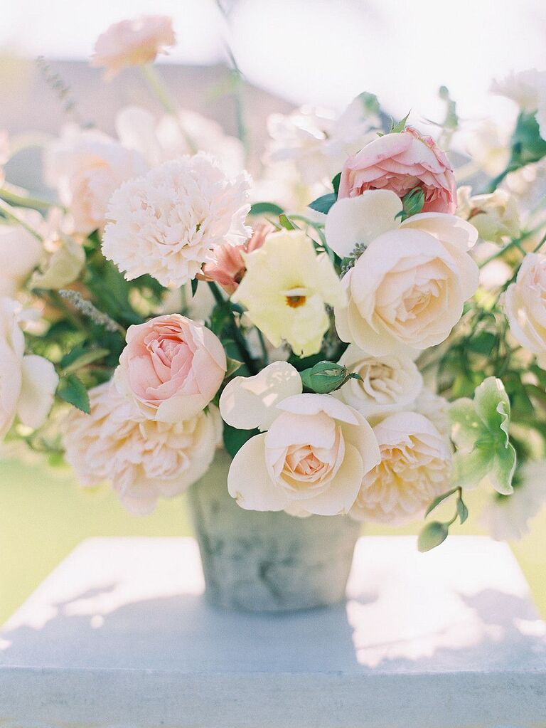 Lush centerpiece with pink roses. Bridal shower idea 2023. 