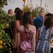 Guests Finding Dinner Seats at Long Tables in Lemon Grove at Private Santa Barbara Residence