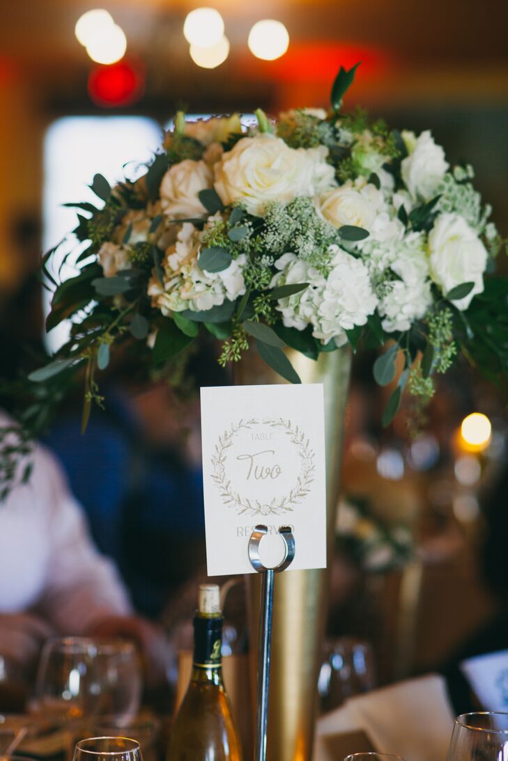 A simple white piece of paper had a table number surrounded by a wreath design, which guided guests to their appropriate seating assignment. The markers contributed to the overall classic look Nadia and Tyler had envisioned for their wedding at Santa Maria Country Club in Santa Maria, California.