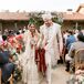 Grooms in Custom, Stylish White-and-Gold Outfits Walk Down the Aisle