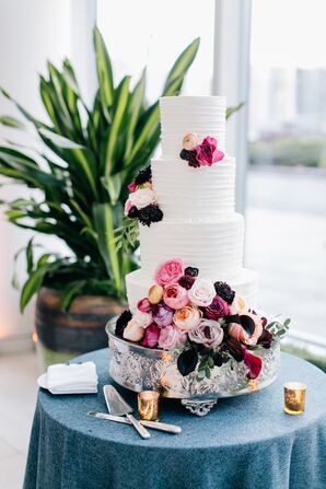 Tiered Buttercream Cake with Floral Accents