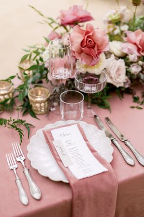 Pink Place Setting With Velvet Linens and Scalloped Plates