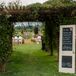 Ivy Covered Archway Leading to Ceremony