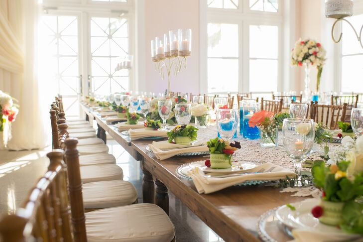 Lace table runners and elegant candelabras channeled vintage on Natalie and Chris's long, family-style wooden dining tables. Dinner started with a beautiful fresh salad, created by Nena Siller of IncrEdible Catering.