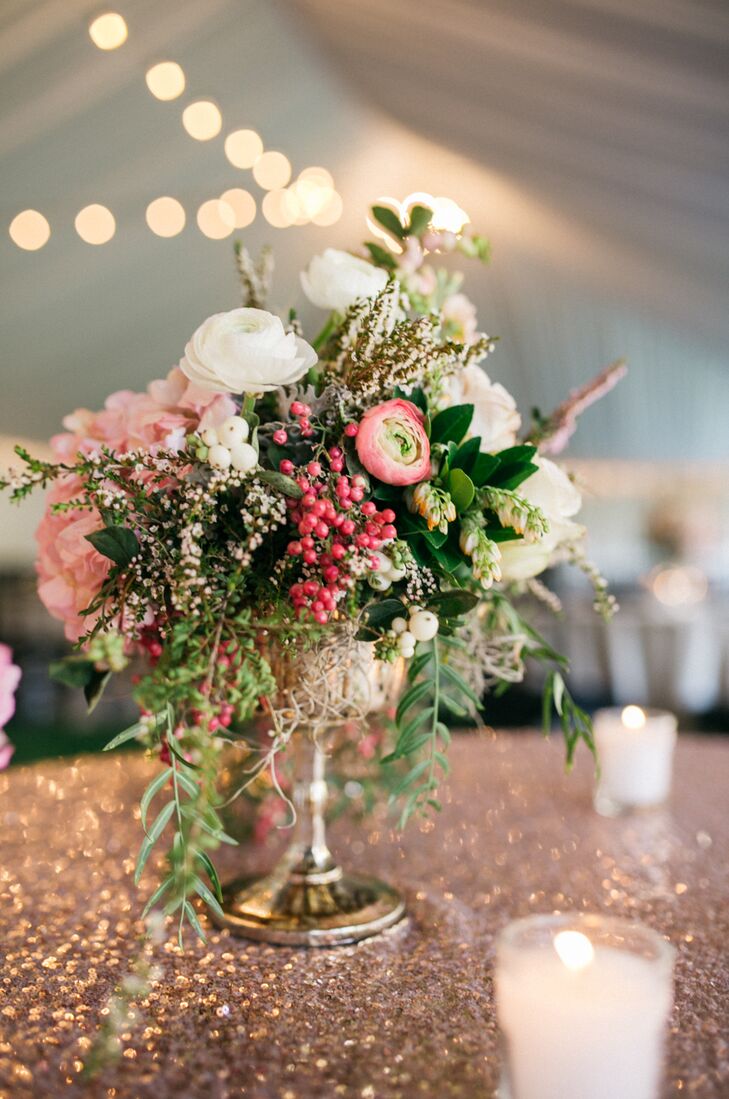 Bouquets and table settings included a mix of cream garden sprays, dusty pink sahara roses, the lightest pink hydrangeas and other florals and greenery.