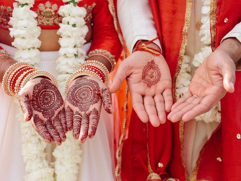 Bride and groom matching henna tattoos