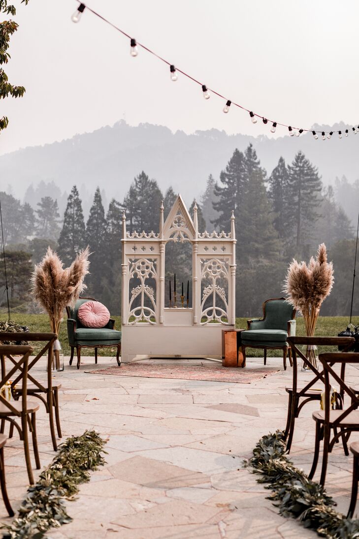Whimsical Forest Ceremony Site with Vintage Furniture and Pampas Grass