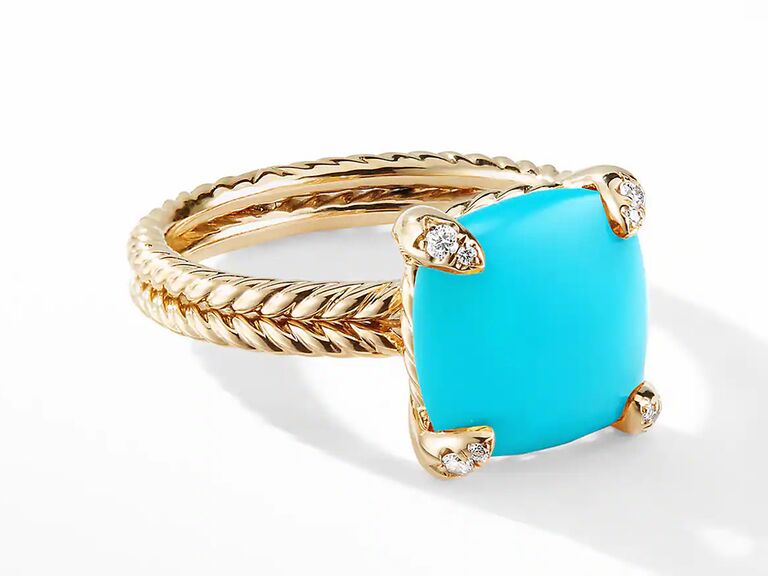 Square turquoise stone with gold prongs and gold braided band