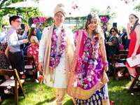 bride and groom at colorful fusion wedding ceremony