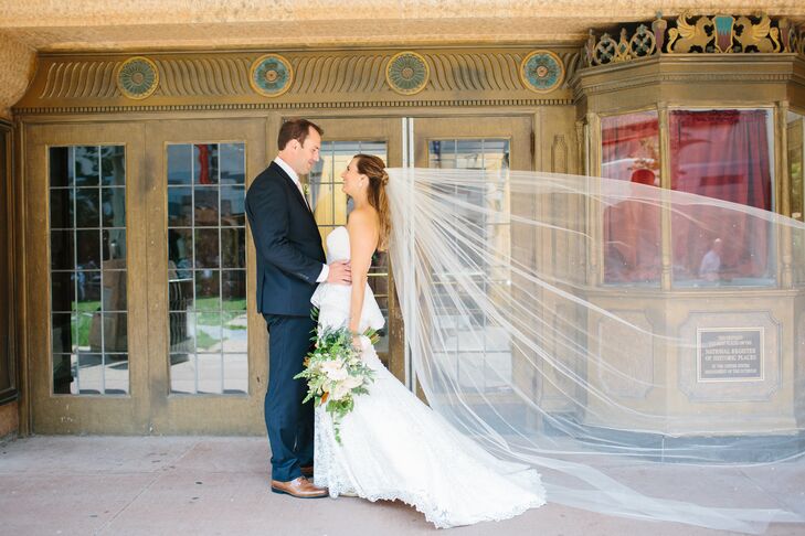 Originally Claire was going to wear this traditional chapel-length, crystal-adorned veil. But because of the 40 mph winds that day, she switched it out for a stunning flower crown that Brianna from Modern Designs and Concepts threw together.