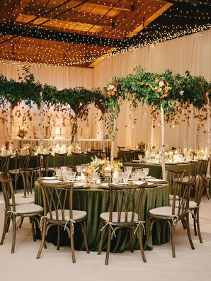 Rustic Wedding Reception With Wood Chairs and Green Linens