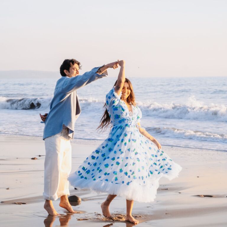Dancing on the beach engagement photo