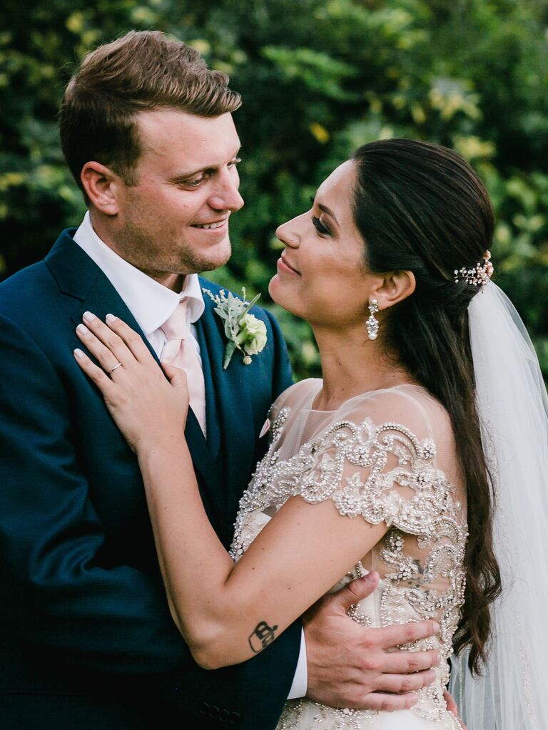 half up half down wedding hairstyle with barrette and veil