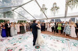 First Dance on Patterned Dance Floor Under Clear-Top Tent