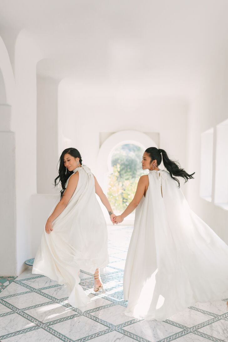 Brides in Boho Wedding Dresses Holding Hands