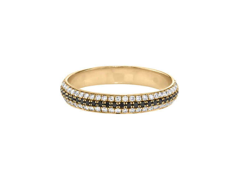 This engagement ring from Broken Earth shines with a band of black diamonds sandwiched between two white bands.