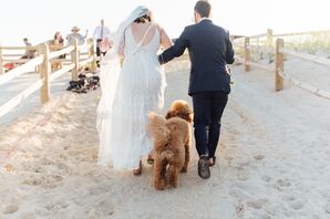Couple Recessing with Pet Dog at Beach Ceremony