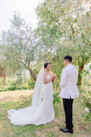 Bride and Groom Exchange Vows Outside in Tuscany Amid Olive Trees, Natural Setting