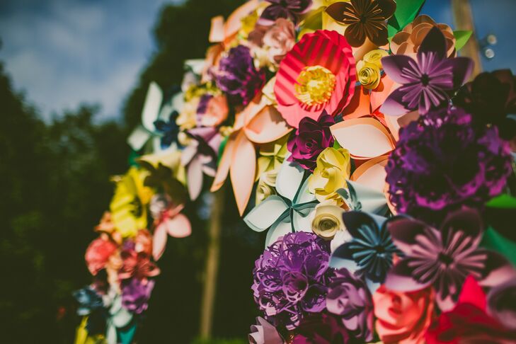 “We had a paper flower arch at the head of the patio, where we exchanged vows,” says Kim. “The flowers were representations of poppies, roses, gardenias and hydrangeas.”