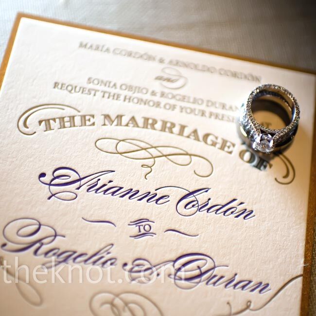 The couple sent out gold-and-purple letterpress invites printed in both English and Spanish.