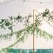 Tented Outdoor Reception With Hanging Greenery, Long Tables, Checkered Dance Floor at Garden Wedding