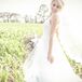 Shira wore a gown that she altered herself. She took out the entire back and used the lace applique from the back of the dress to make straps!