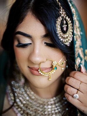 Indian Bride With Traditional Gold Jewelry and Nose Ring