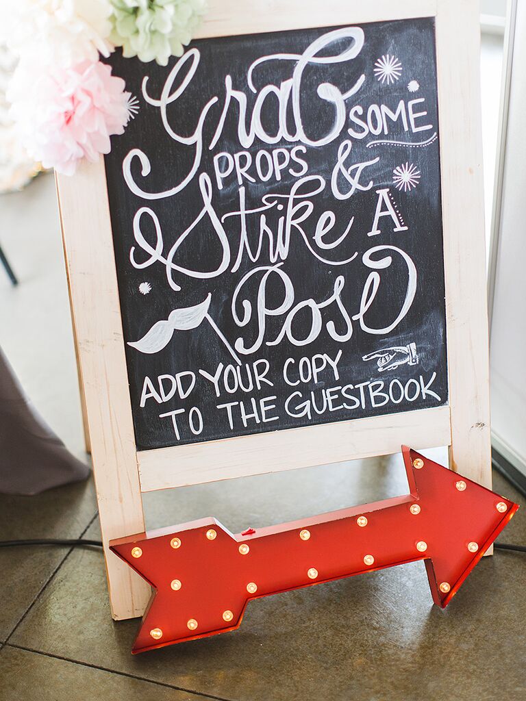 Fun chalkboard wedding sign for a photo booth