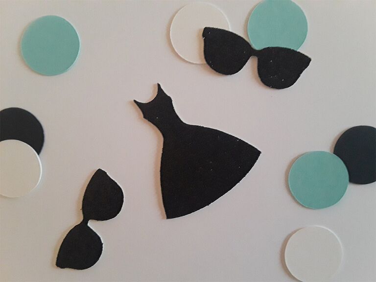 Little black dress, sunglasses and circle blue and white confetti 