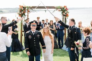 Bride and Groom During Recessional Under Military Swords