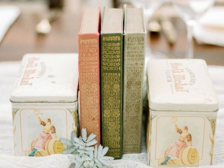 vintage books and tins as wedding centerpiece