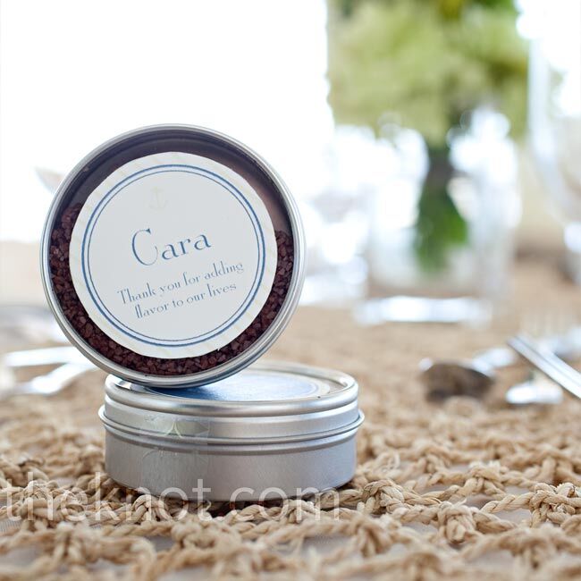 The favors doubled as place cards at each table, donning the guest’s name and a tagline that read, “Thanks for adding flavor to our lives.” Inside each tin was sea salt for guests to use in the kitchen.