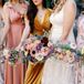 Bride and Bridesmaids in Different Color Dresses With Tie-Dye Bouquets