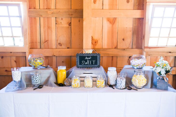 Lauren and Drake set up a sweet spread made up of candies in different colors. Guest received mason jars, which they filled with candy and took home.