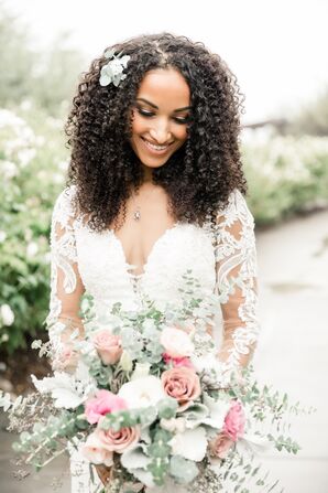 Bride With Curly Hair and Long-Sleeve Wedding Dress