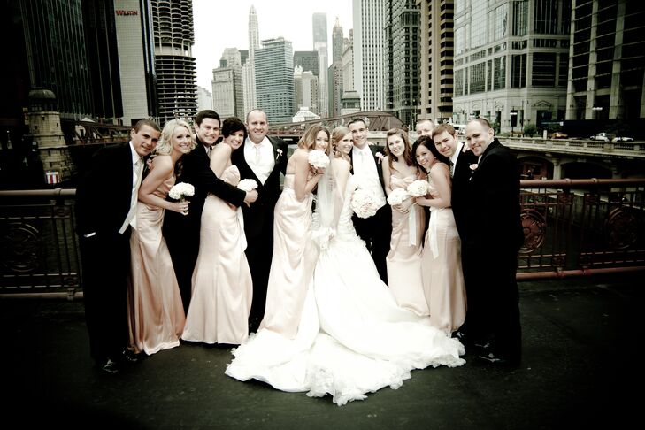 Bridesmaids wore blush-colored charmeuse dresses by Melissa Sweet.