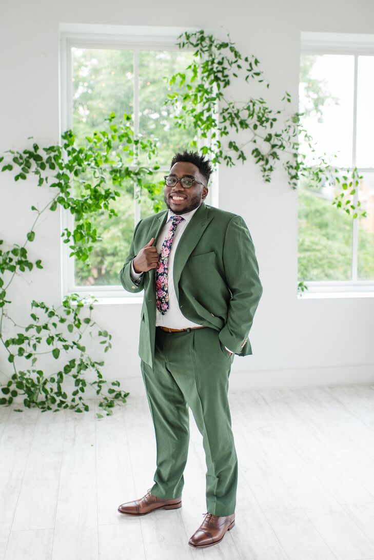 Groom in Green Suit for Enchanting Elopement Ceremony