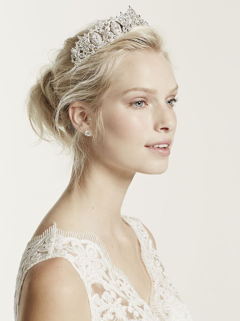 Model wears a regal tiara featuring crystals. 