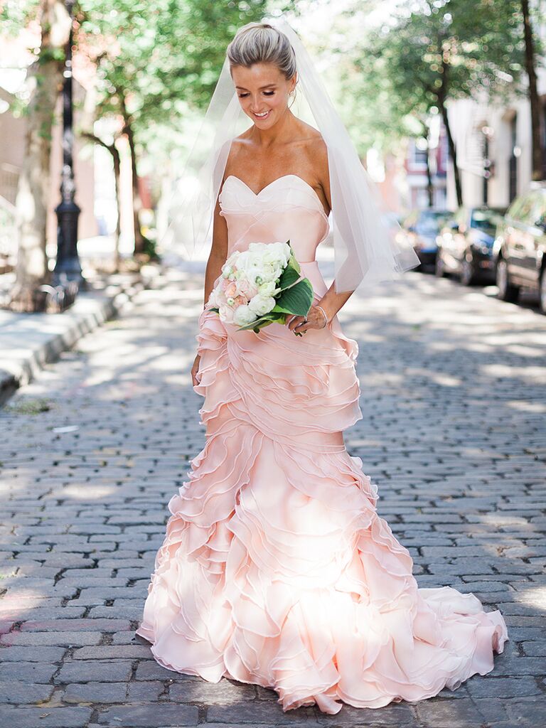 Light pink fit and flare wedding gown by Leanne Marshall