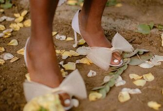 whimsical bow-topped bridal heels for one of the best wedding shoes for brides