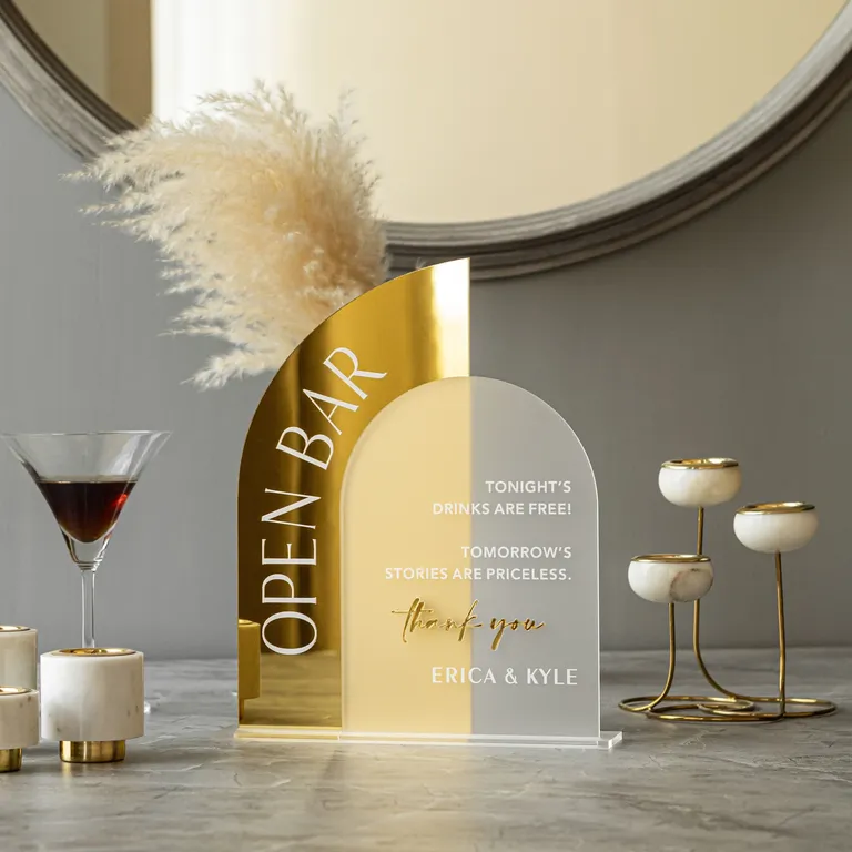 Gold arched open bar sign with white and gold lettering for wedding bar sign