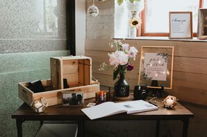 Wood Table with Guest Book and Romantic Decorations